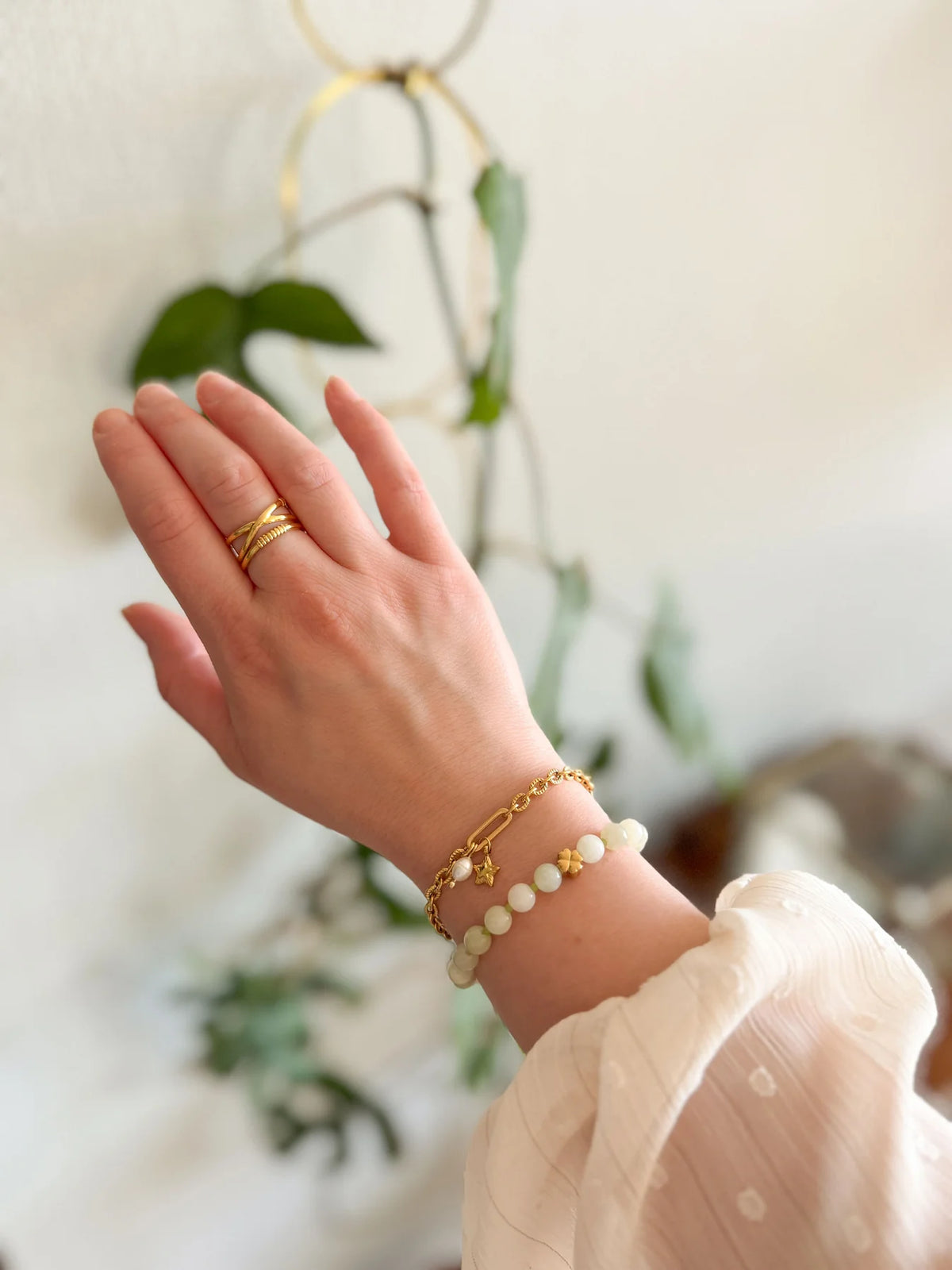 Schakelarmband parel & sterretje goudkleurig