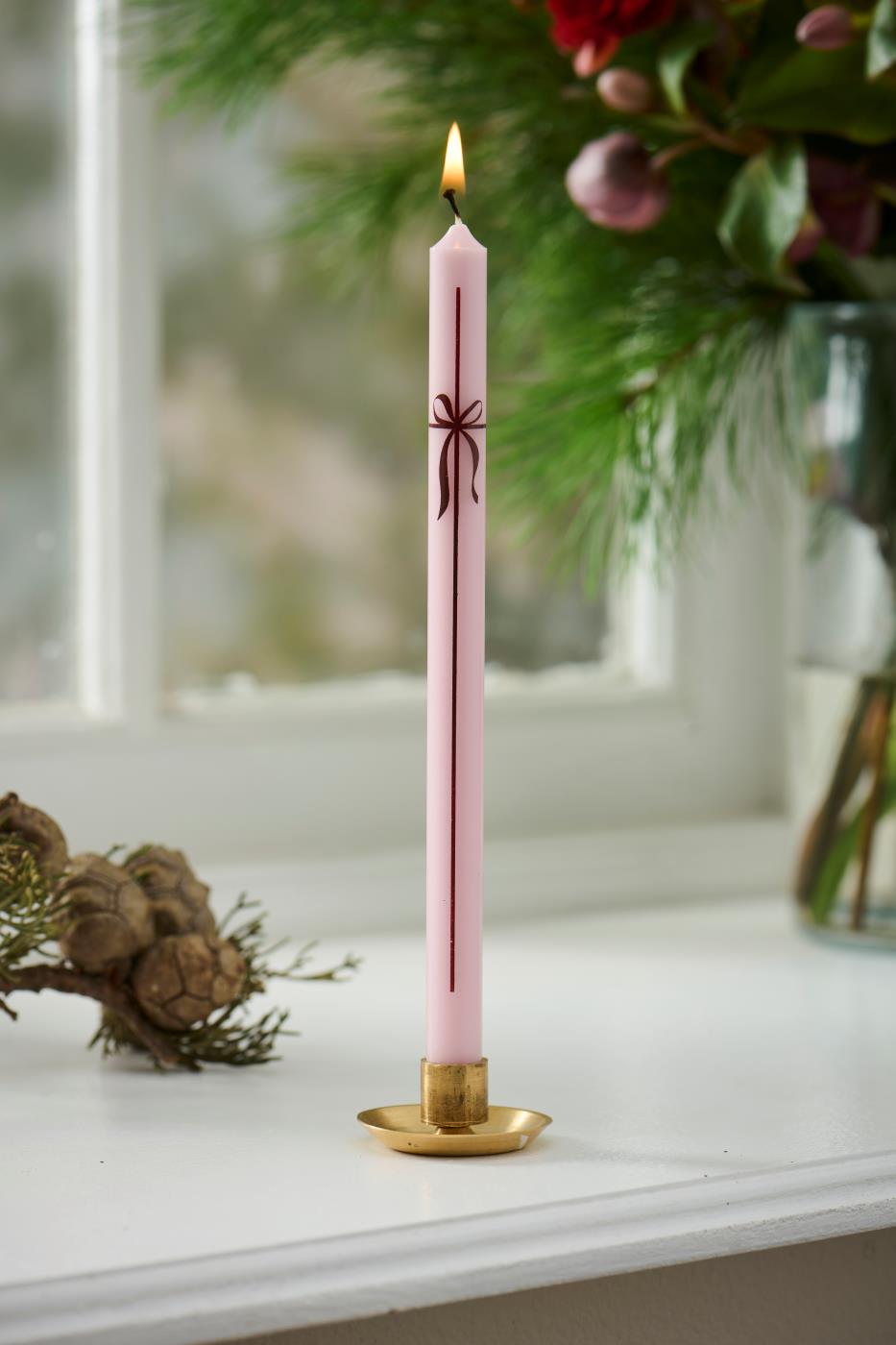 Licht roze kaars met strik